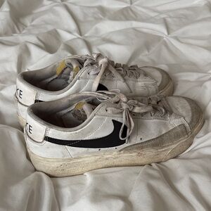 Nike White Leather Low-Top Sneakers with Black Swoosh